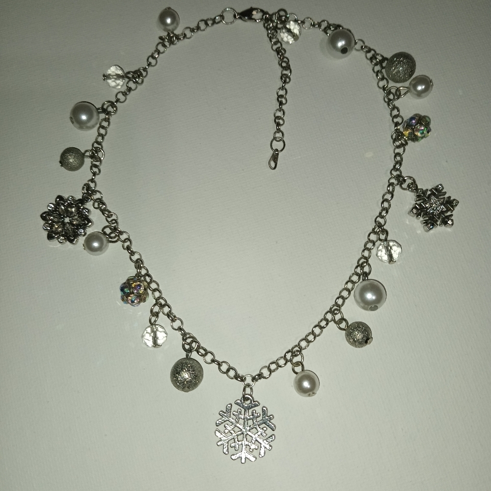 Silver Charm Necklace with Floral Details